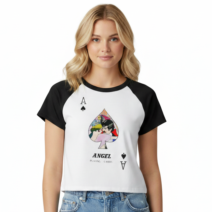 Woman wearing a black and white baseball-style t-shirt with a colorful graphic design on a white background